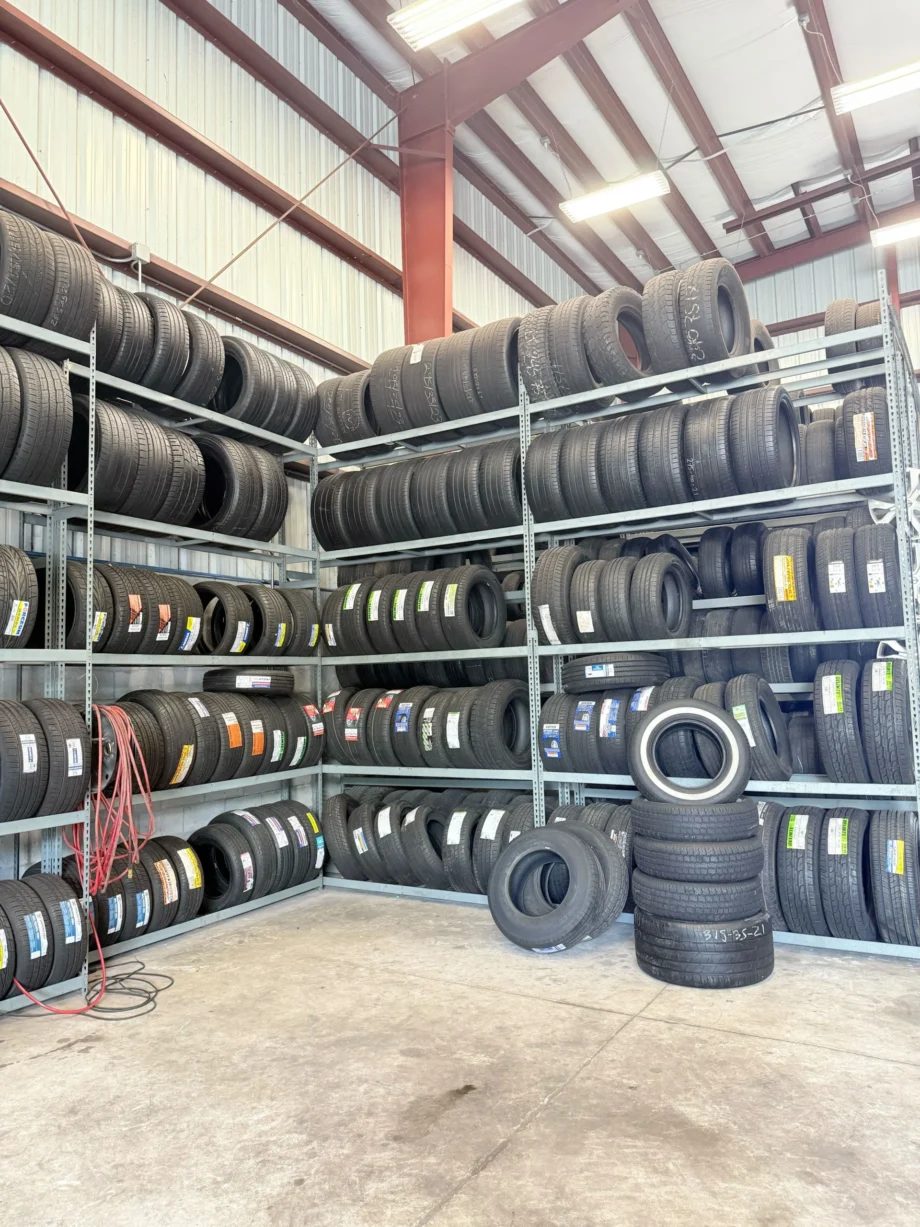 Tires stacked on warehouse metal shelving